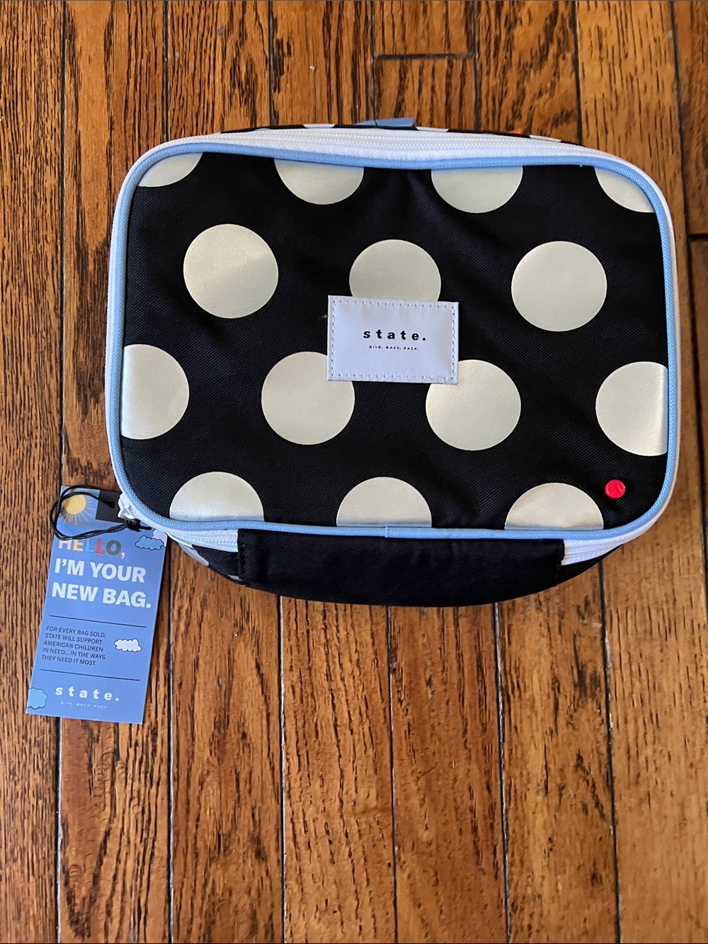 STATE Light Blue and White Illustrated Tag with Yellow Accents